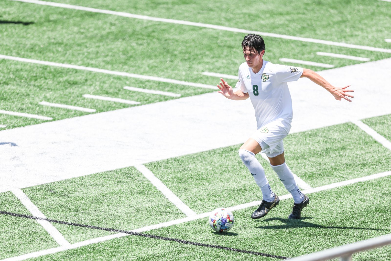 Oscar on the ball during a Cal Poly NCAA Division 1 match