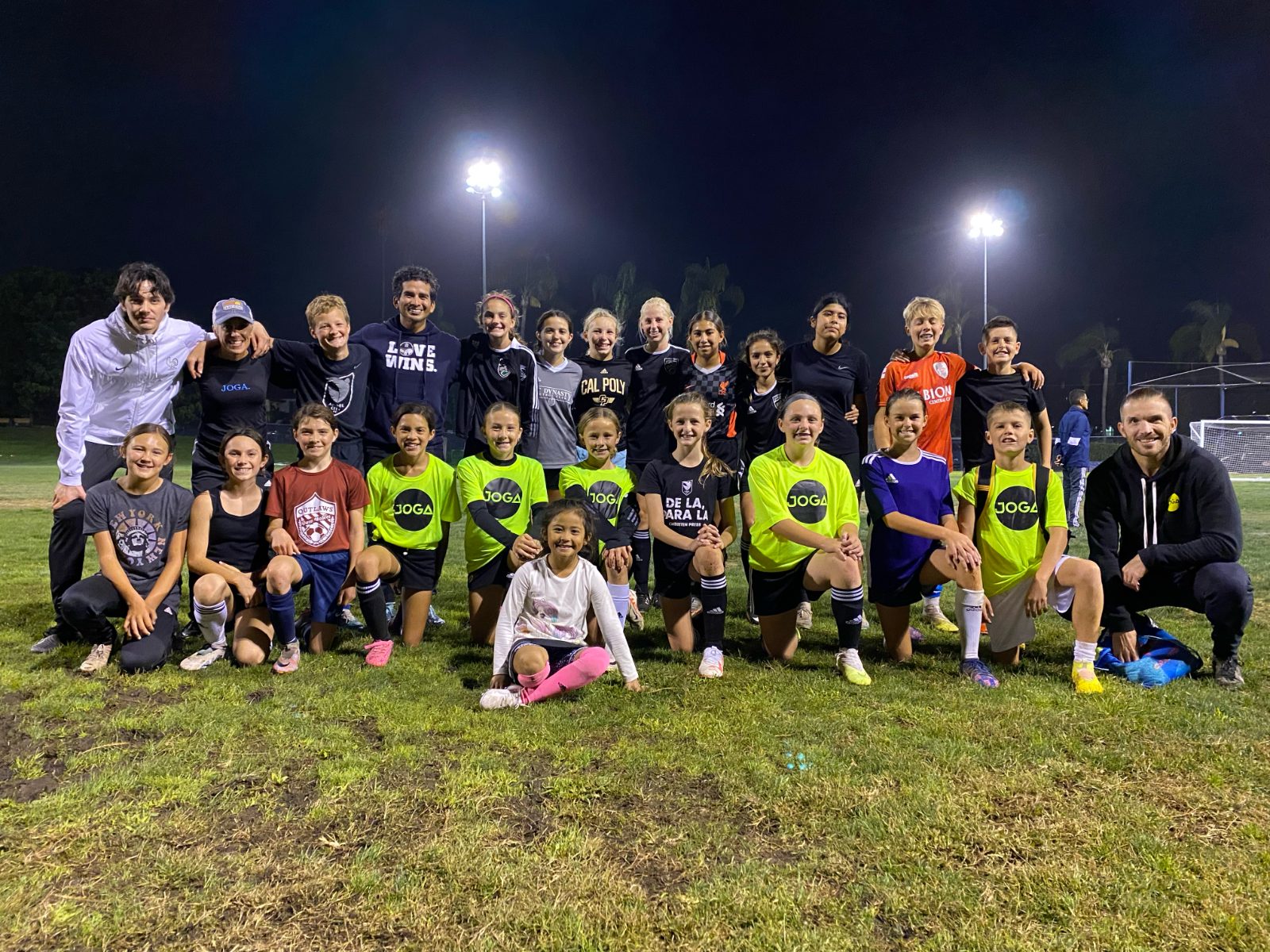 Youth session group photo under floodlights